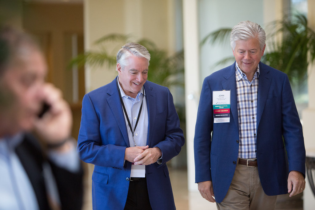 men walking talkking business seminar event meeting ritz carlton laguna niguel