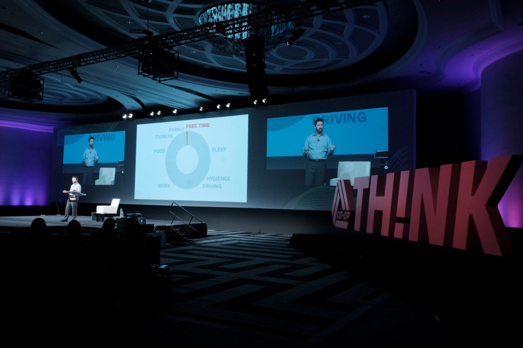 speaker onstage miami lowes business conference