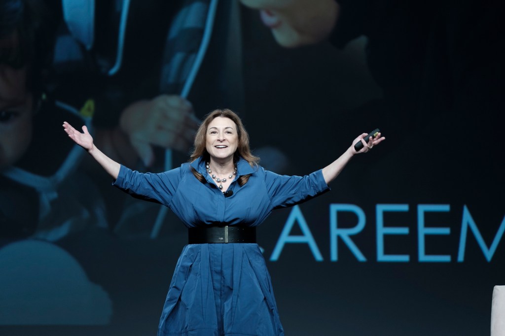 speaker onstage miami lowes business conference