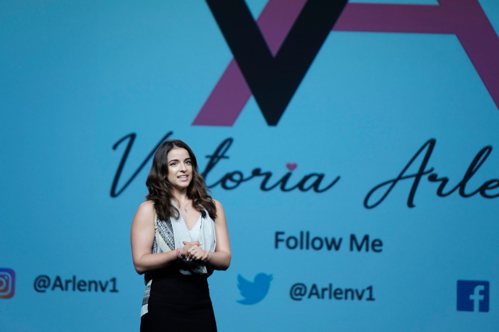 speaker onstage miami lowes business conference