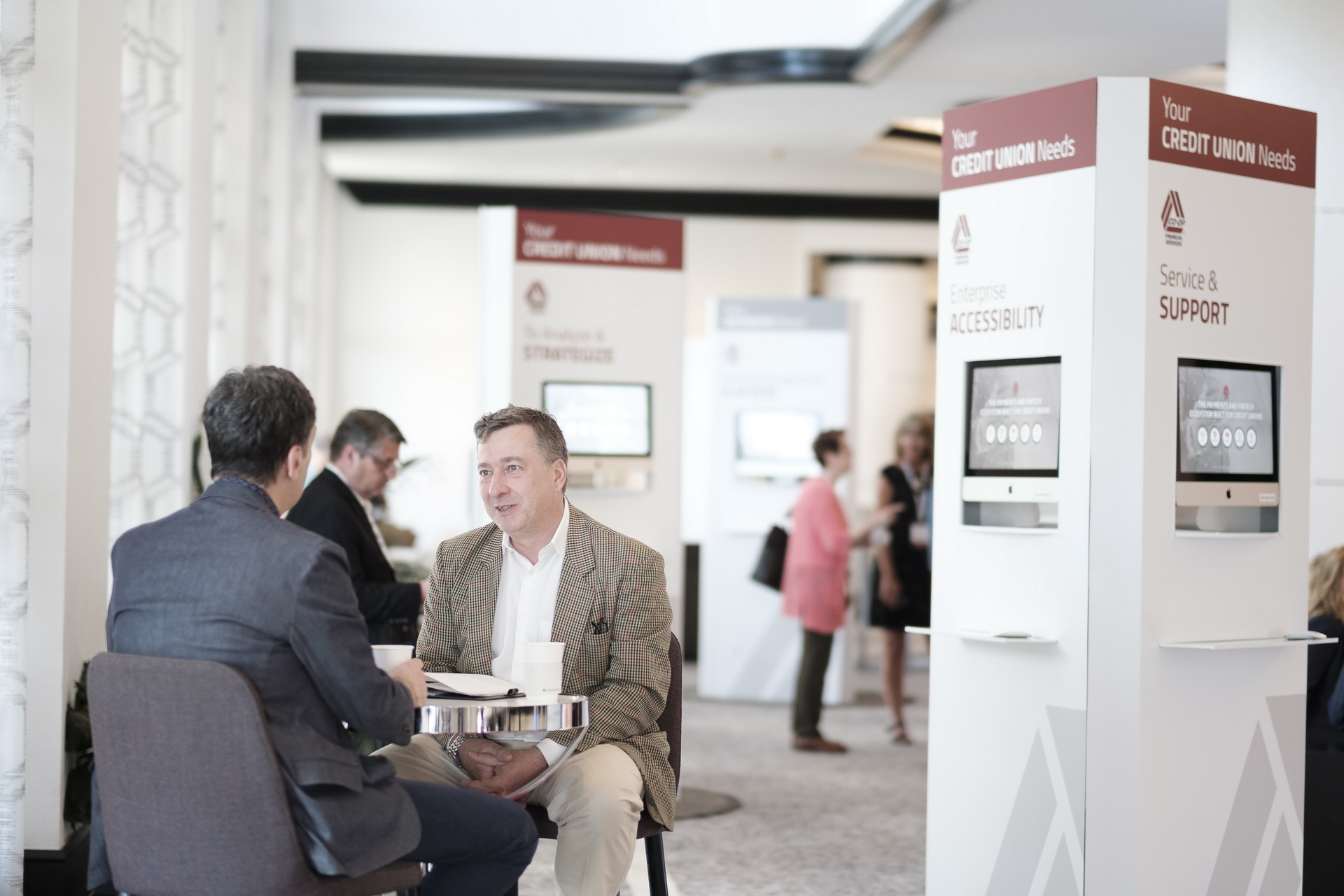 speakers on stage business corporate conference seminar