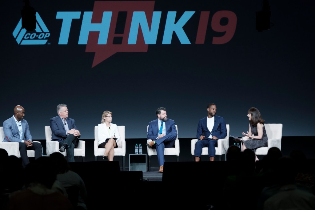 expert panel onstage business conference miami beach loes hotel