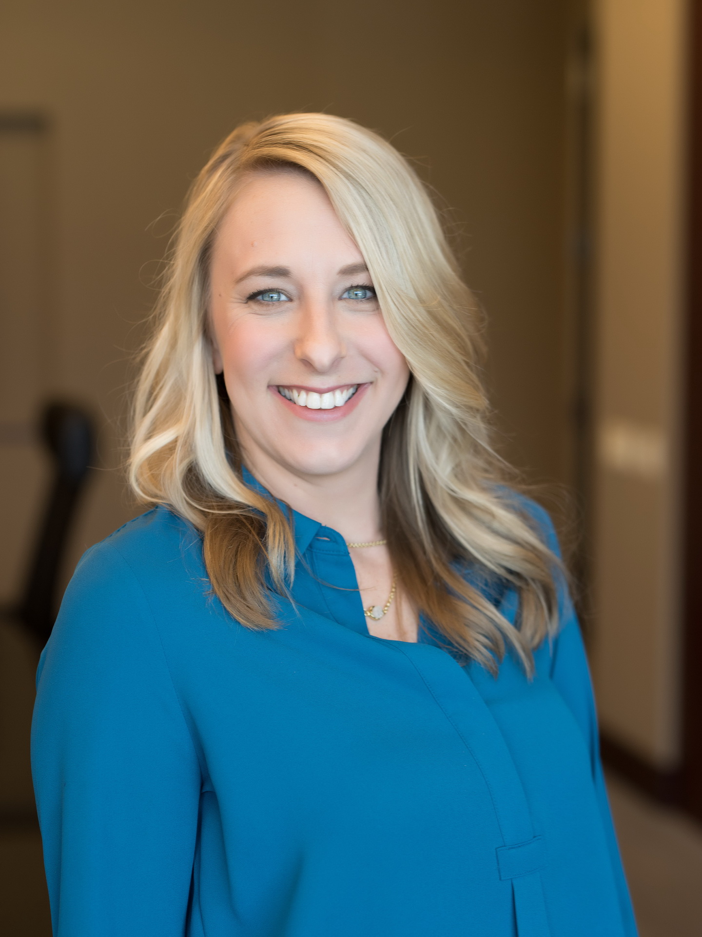 relaxed business headshot enviornmental portrait boardroom