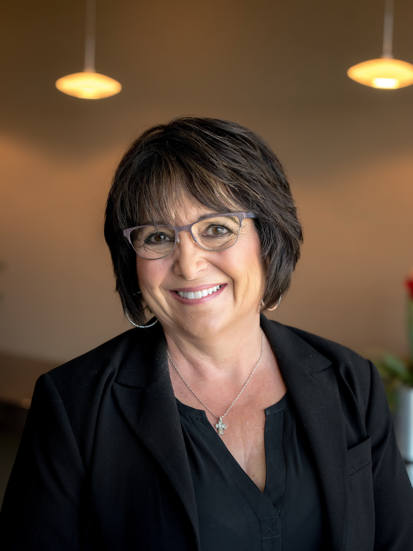 relaxed business headshot enviornmental portrait boardroom