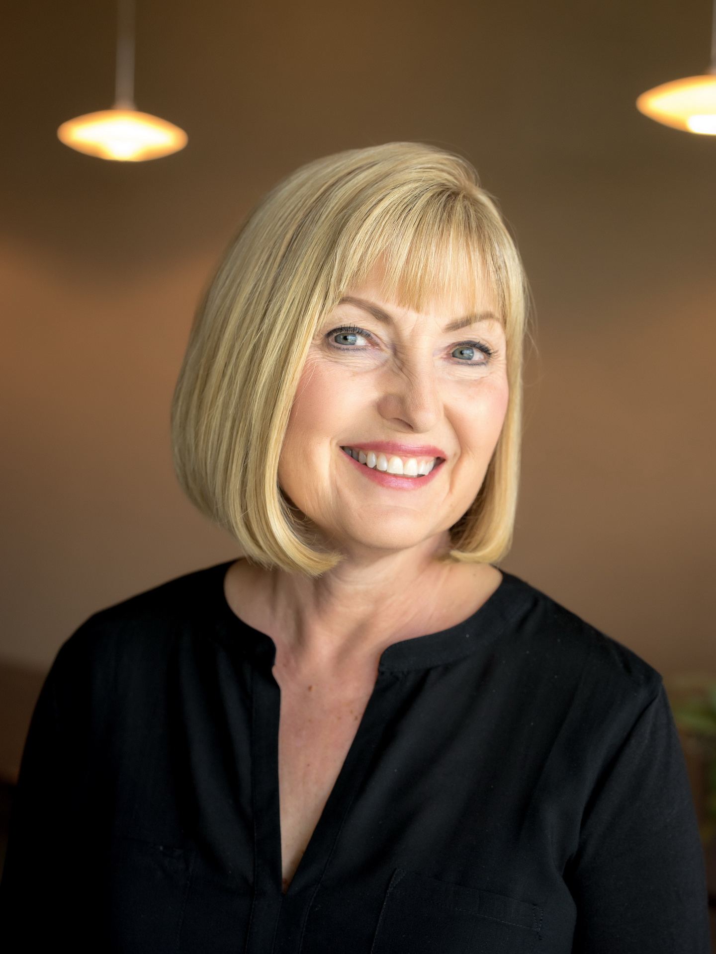 relaxed business headshot enviornmental portrait boardroom