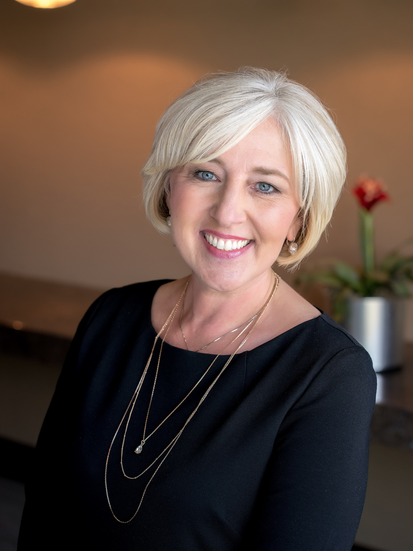 relaxed business headshot enviornmental portrait boardroom