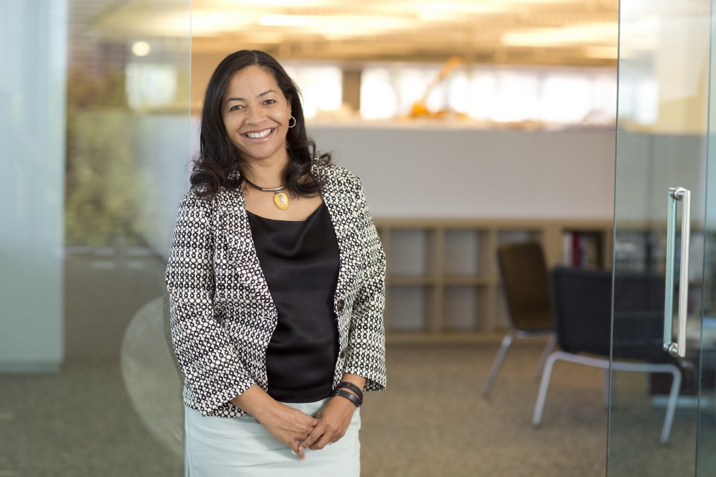 Executive business portraits office setting relaxed